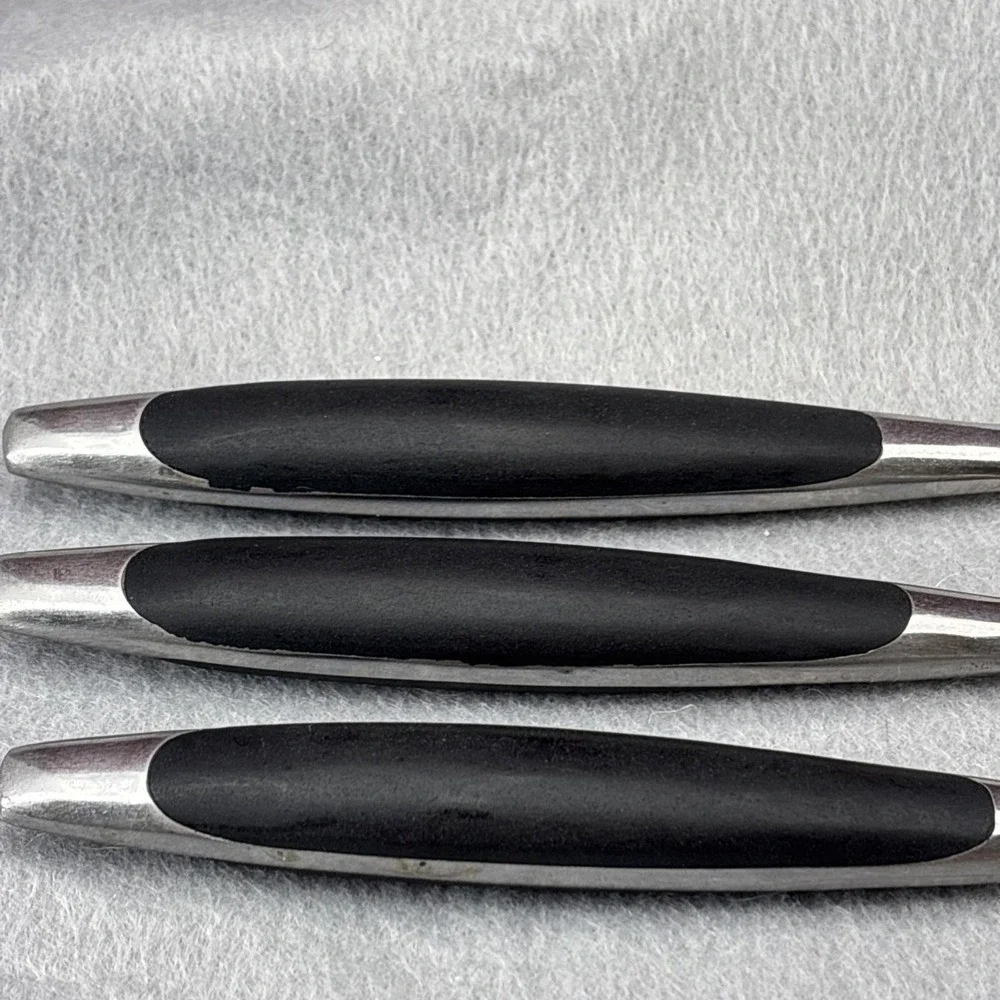 SSI Stainless Japan Black Canoe Style Resin Handle Serrated Edge Dinner Knife 6